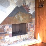 Lower level exterior fireplace off bedroom suite